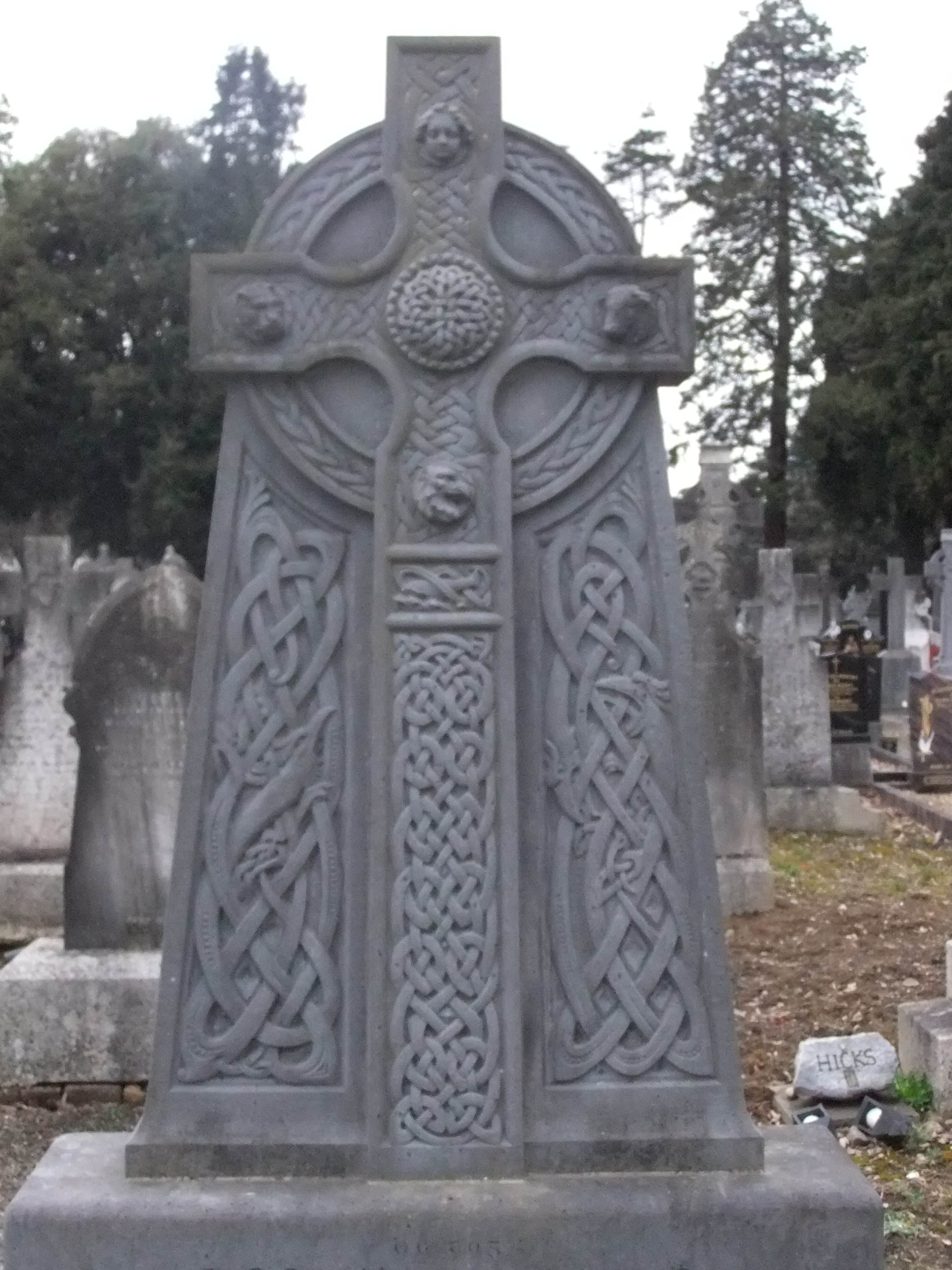 Cait O'Kelly Memorial, Glasnevin Cemetery, an elaborate Celtic high cross by Albert Power, 1936
