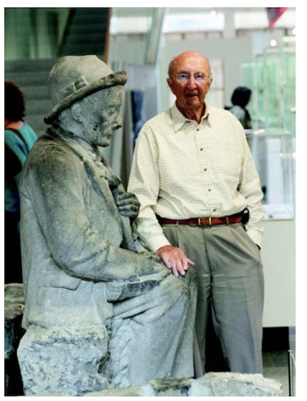 Christopher Noel Power beside the original model of the Ó Conaire statue, Galway City Museum