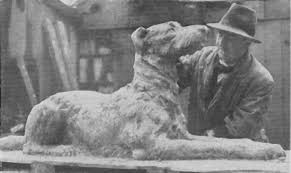 Albert Power modelling a wolfhound for the Liam Lynch Monument, 1935, with sculptor Denis Doyle